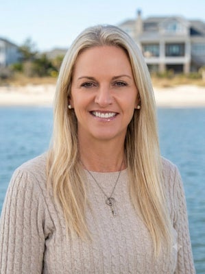 Portrait of Tiffany Baker, Broker/REALTOR®